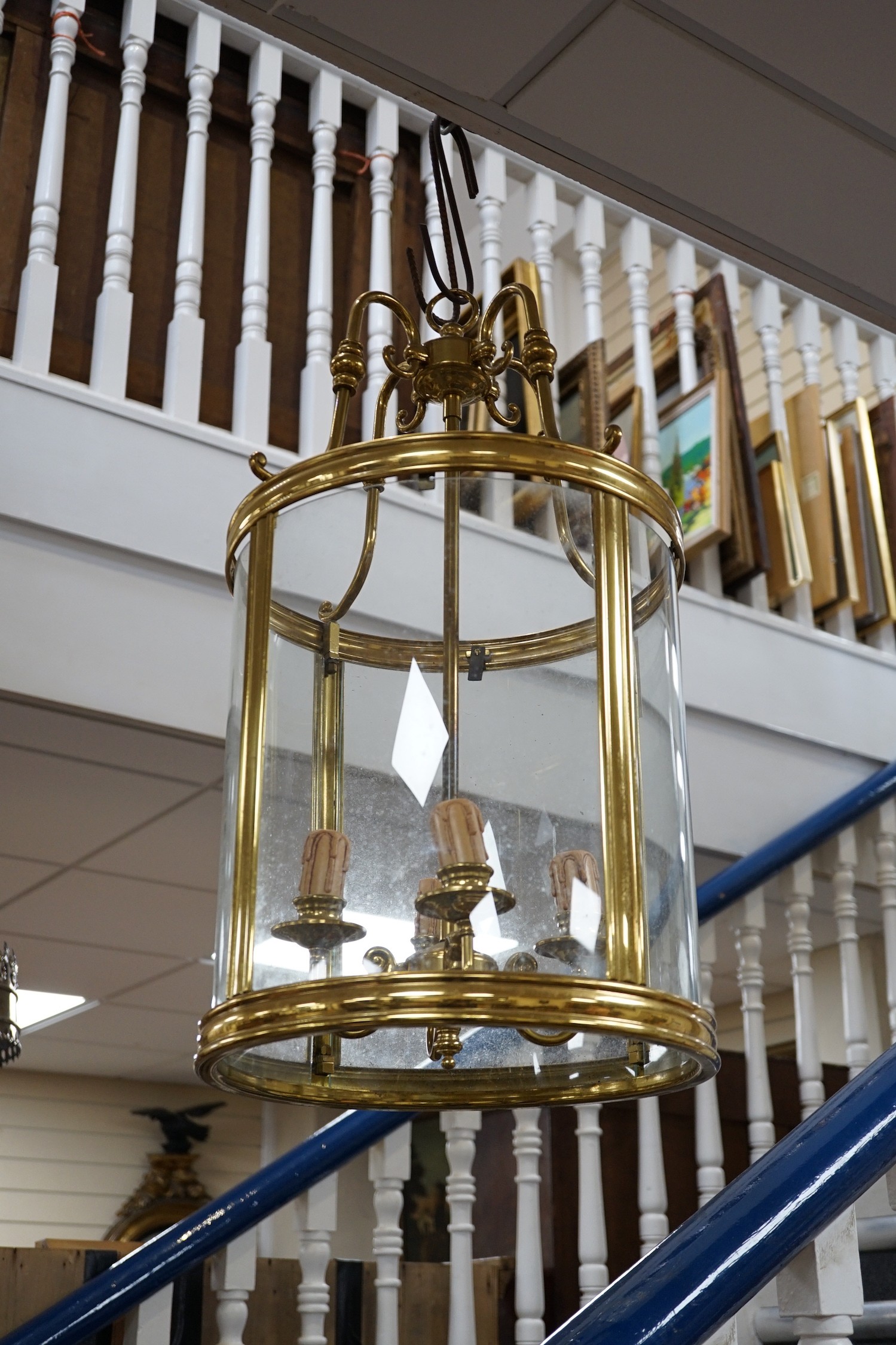A four light brass hall lantern, 62cm tall